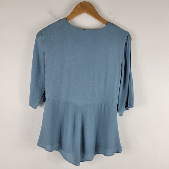 Lovers + Friends Boulevard Lace Up Split Flutter Sleeve Ruffle Peplum Flowy Top - Picture 11 of 12